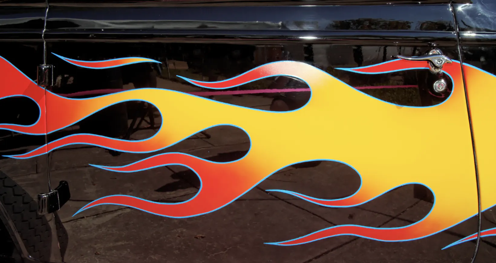 Flame detailing on side of car